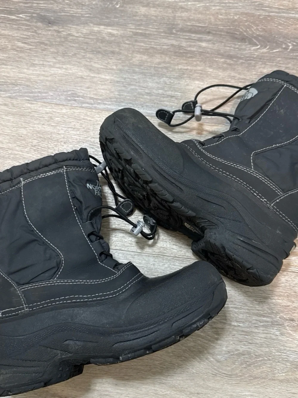 The North Face Kids Black Insulated Snow Boots with Bungee Closure